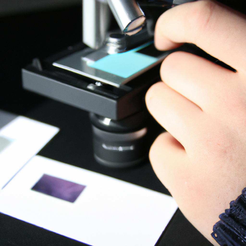 Person examining microscope slides